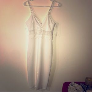 Never been worn white V-cut dress